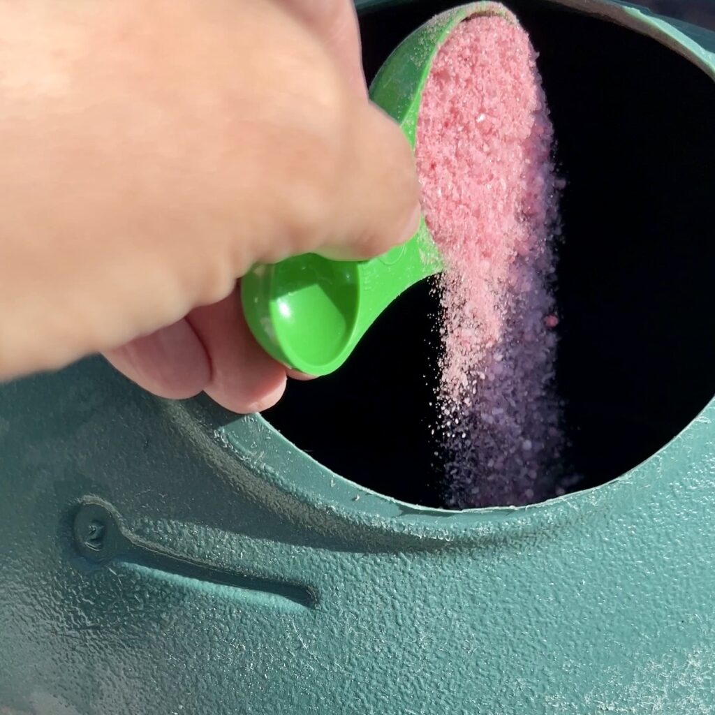 adding rose fertilizer