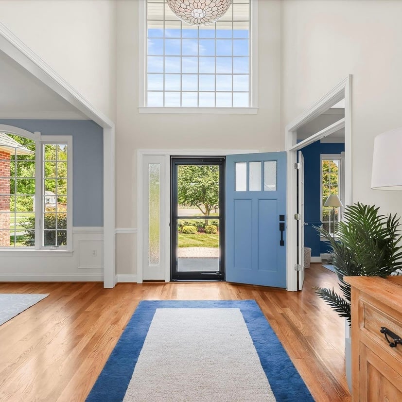 A coastal front door painted with Sherwin Williams Poolhouse